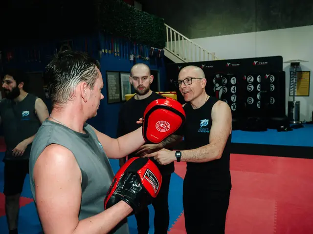 Focus-mitt training with an instructor at JKD Legacy Academy